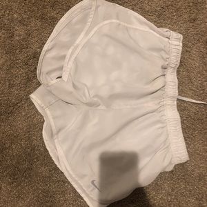White Nike shorts